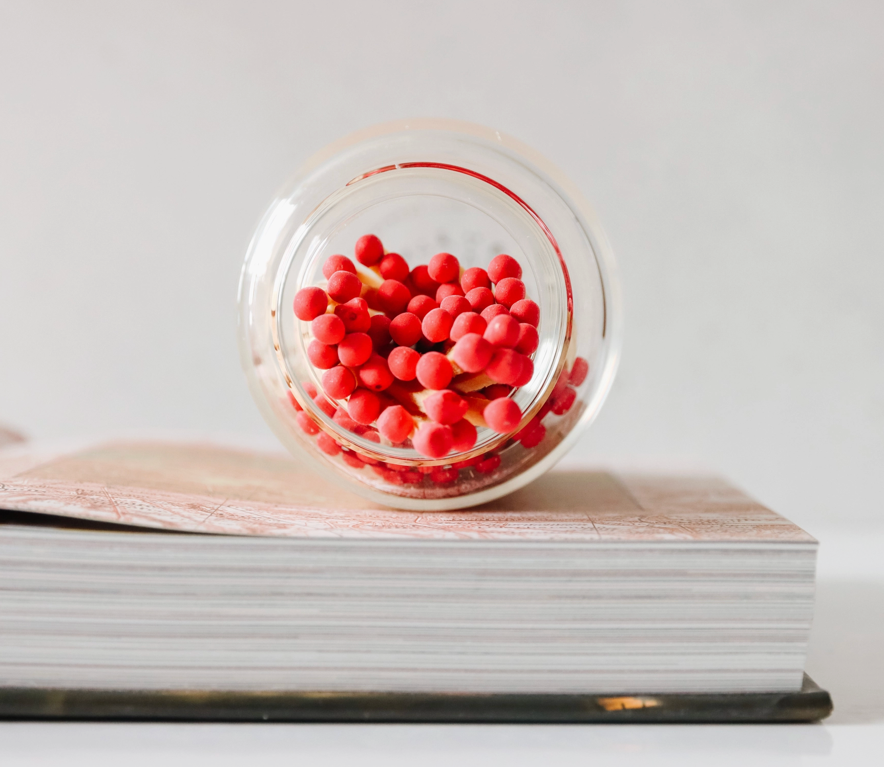 Red Matches in Wood-Lidded Glass Jar